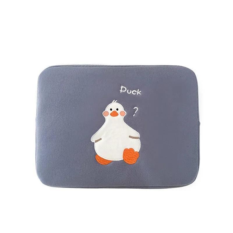 Blue cotton tablet case with embroidered cartoon duck design and a zipper closure, shown next to a green version.