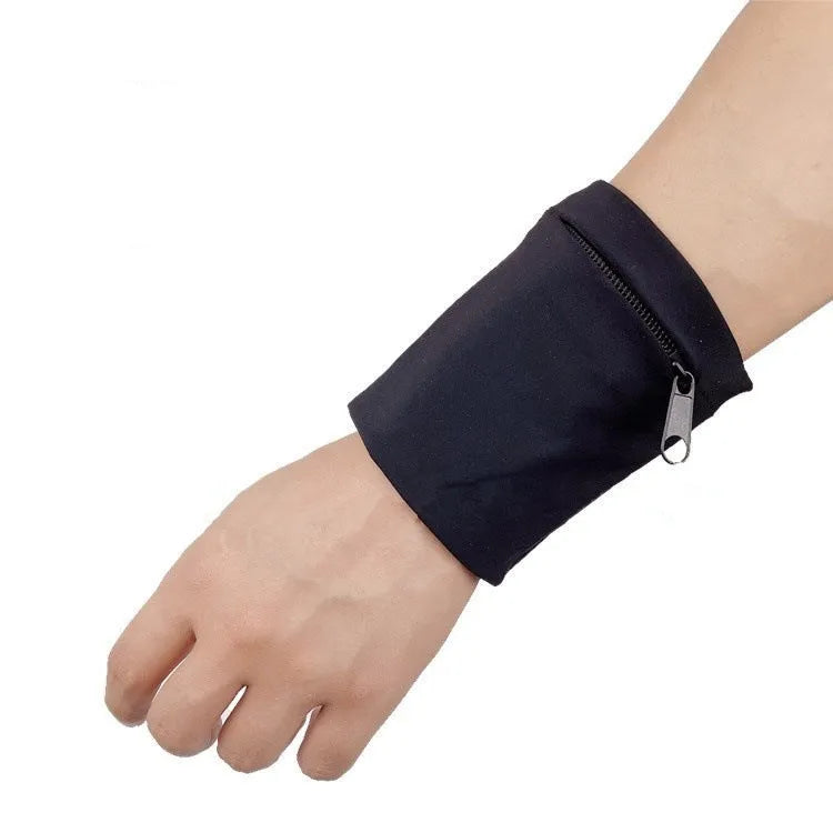 Black wrist armband with adjustable strap and a 10cm by 10.5cm main compartment for a mobile phone.