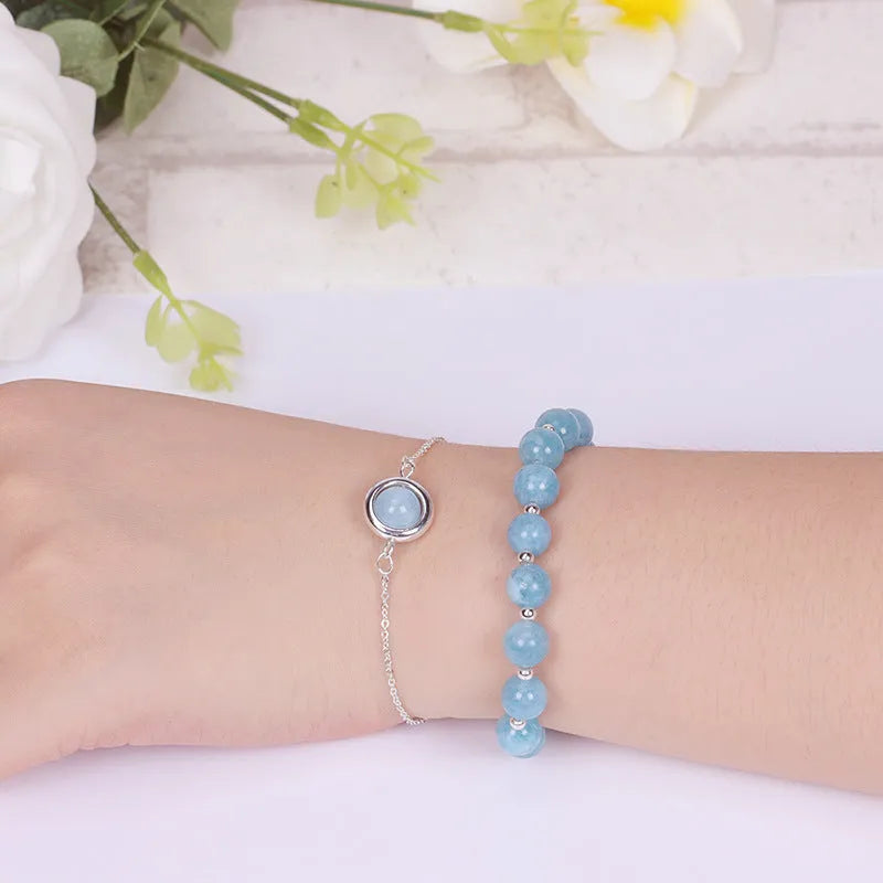 Double-layer women's bracelet with crystal beads and lucky charms in gold electroplated finish