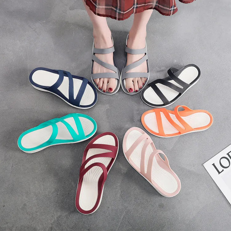 Women's solid colour PP beach sandals in red, purple, blue, black, grey, or pink showing slip-on casual style