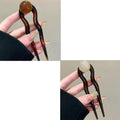 U-shaped hair barrettes with retro ball design in acrylic material showing colour options