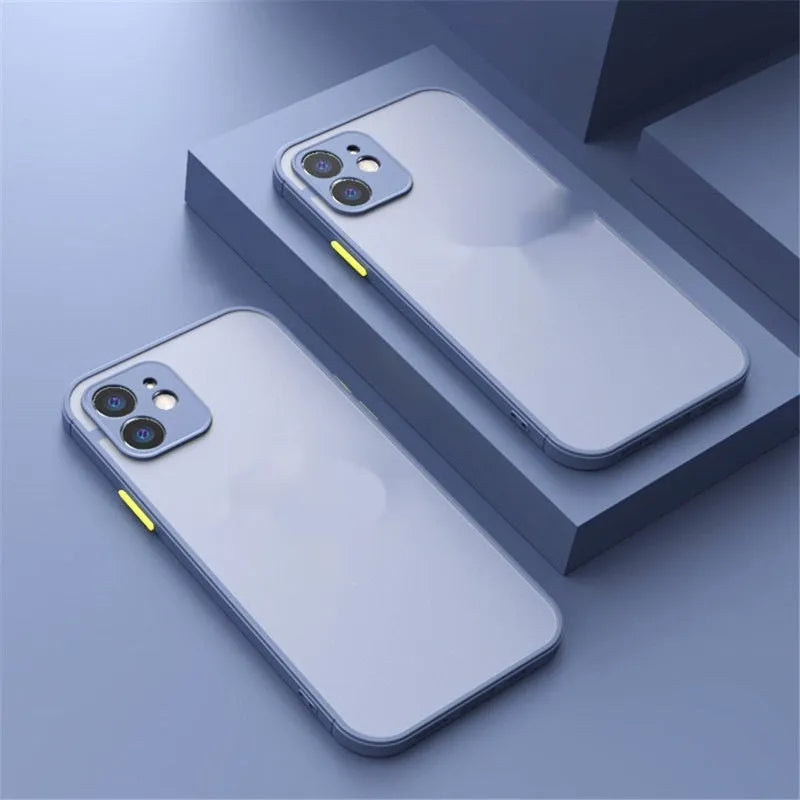 Frosted skin magnetic suction iPhone case in multiple colours on a table