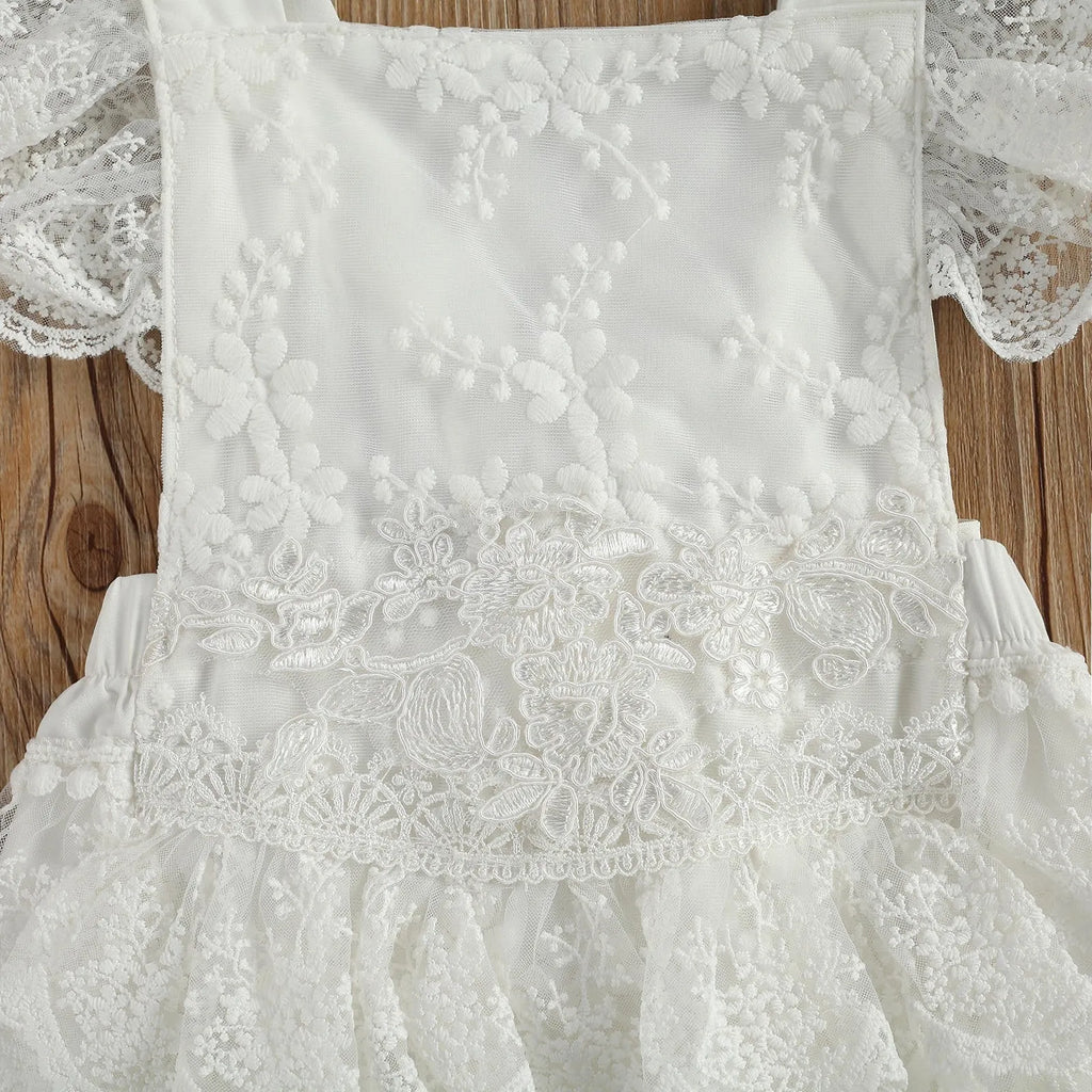 White polyester baby Christmas bodysuit for unisex children aged 3 to 24 months.