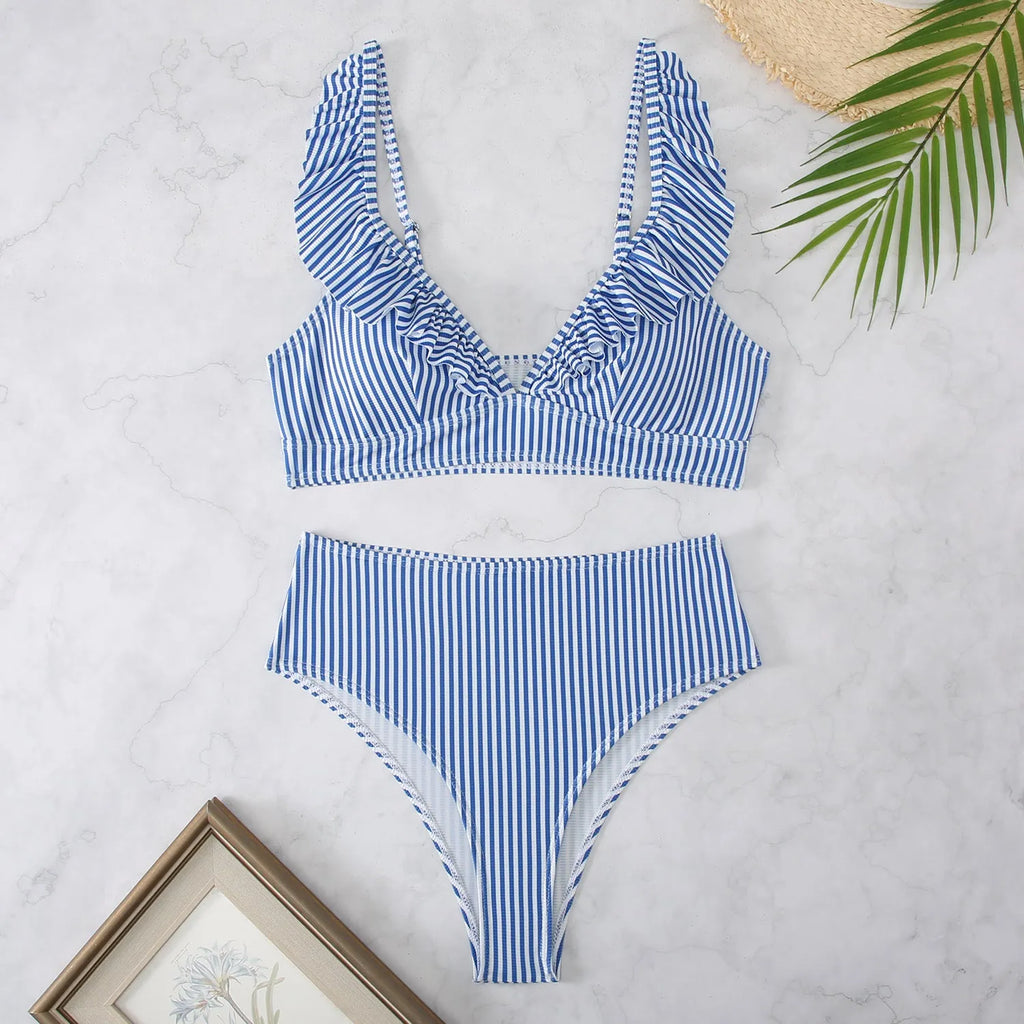 Black and white striped bikini swimsuit with a split chest design.