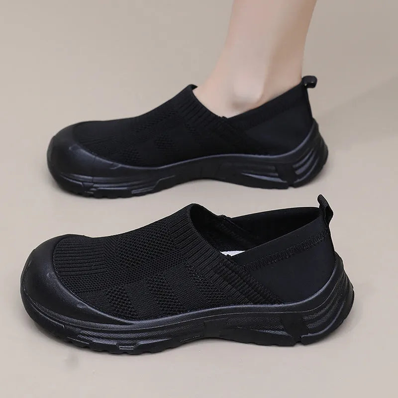 Women's slip-on casual shoes with cloth uppers and soft PVC soles in round toe design