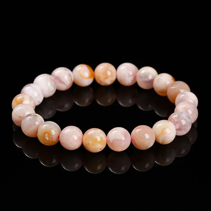 Natural cherry agate bracelet in 3A cherry blossom colour with geometric round shapes