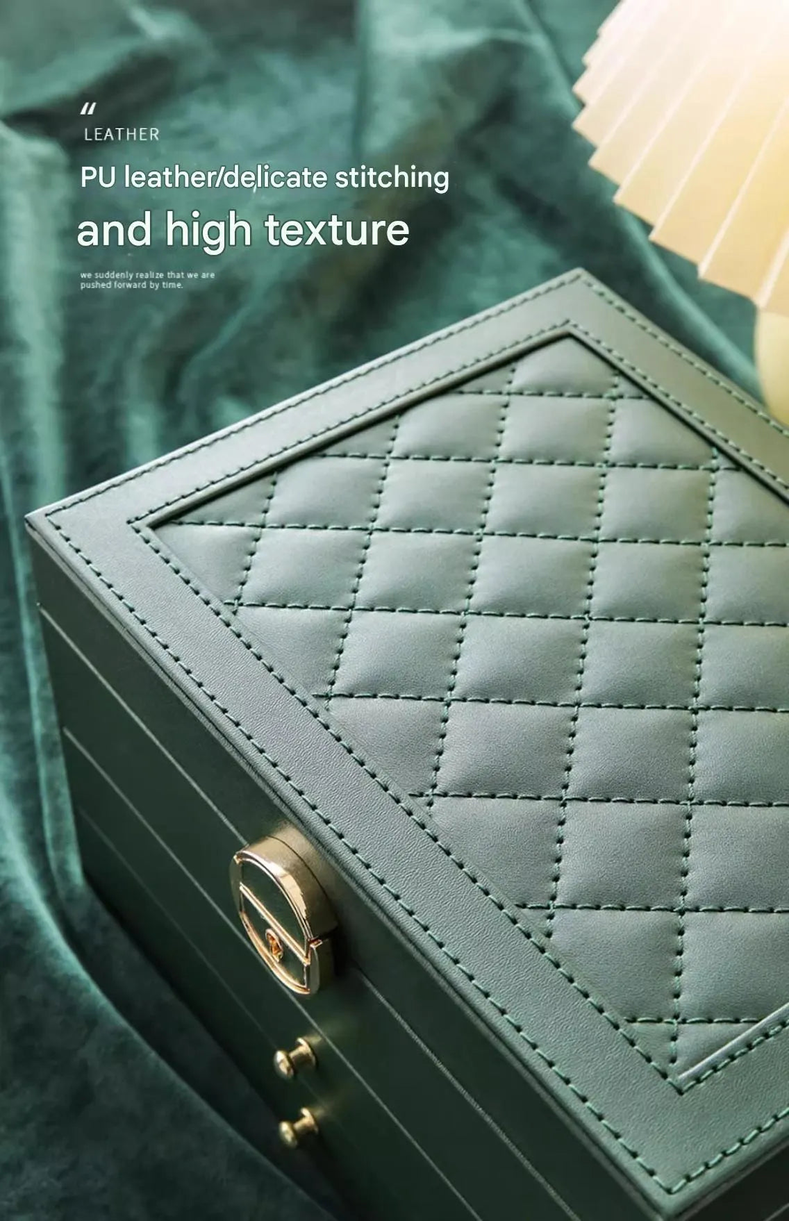 Leather jewellery box with three drawers open, showing storage for necklaces, earrings and bracelets.