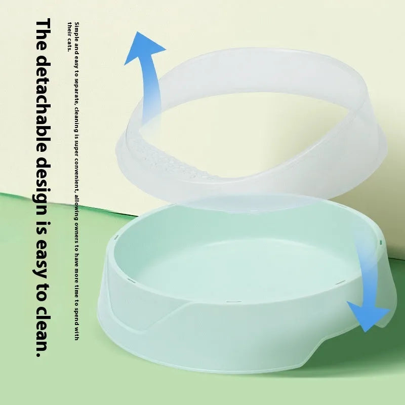 Round enclosed cat litter box in mint green or soft fog pink colours