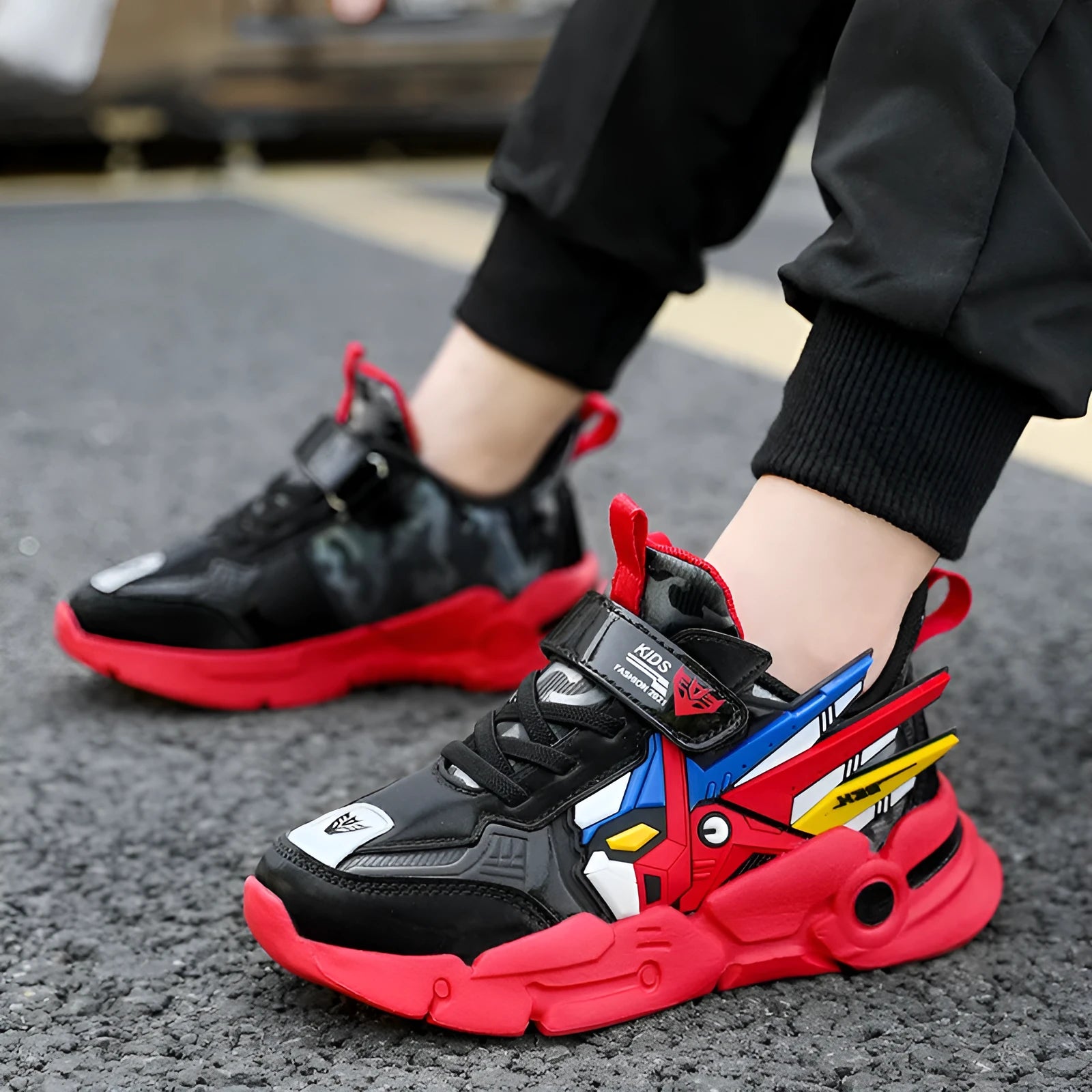 Children's leather surface running shoes with Velcro fastening in yellow, black red, or lake blue colours