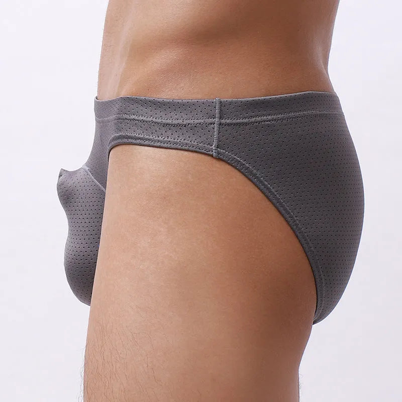 Men's loose-fit navy blue nylon underwear laid flat, showing elastic waistband and leg openings.