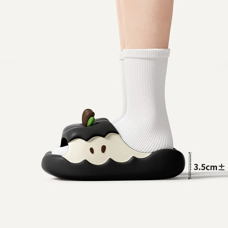 Cartoon fruit patterned EVA flip flop slippers for couples and families on a white background.