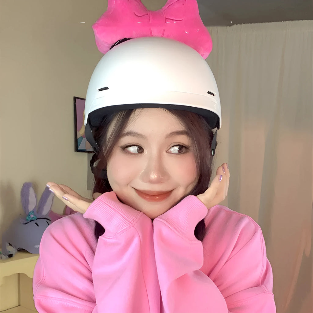 Soft plush bow helmet decoration in red, pink, or rose pink for motorcycle or ski helmet customisation.