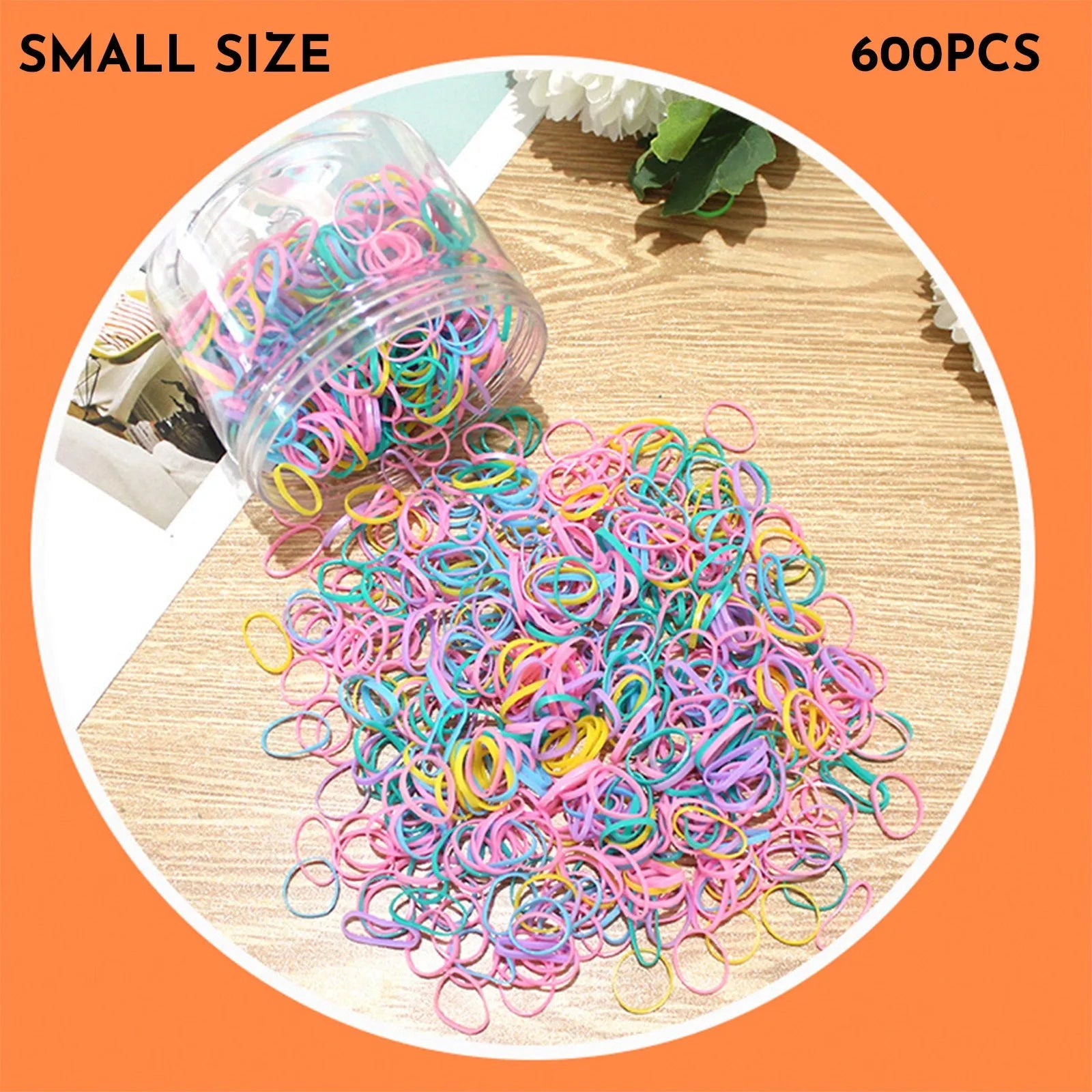 Assorted colourful TPU baby hair ties in a reusable plastic container.