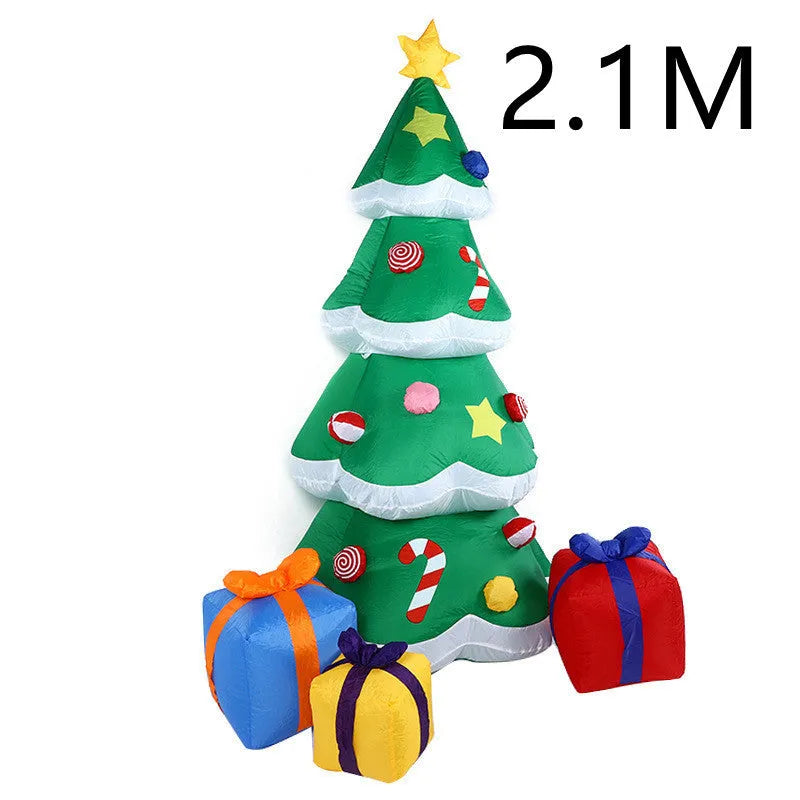 Glowing LED inflatable Christmas decorations including Santa, snowman, and a Christmas tree for outdoor garden use.