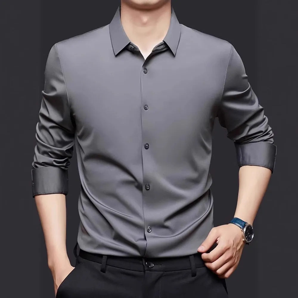 Man wearing a seamless long sleeve elastic shirt in a cardigan style, showing its fit and texture.