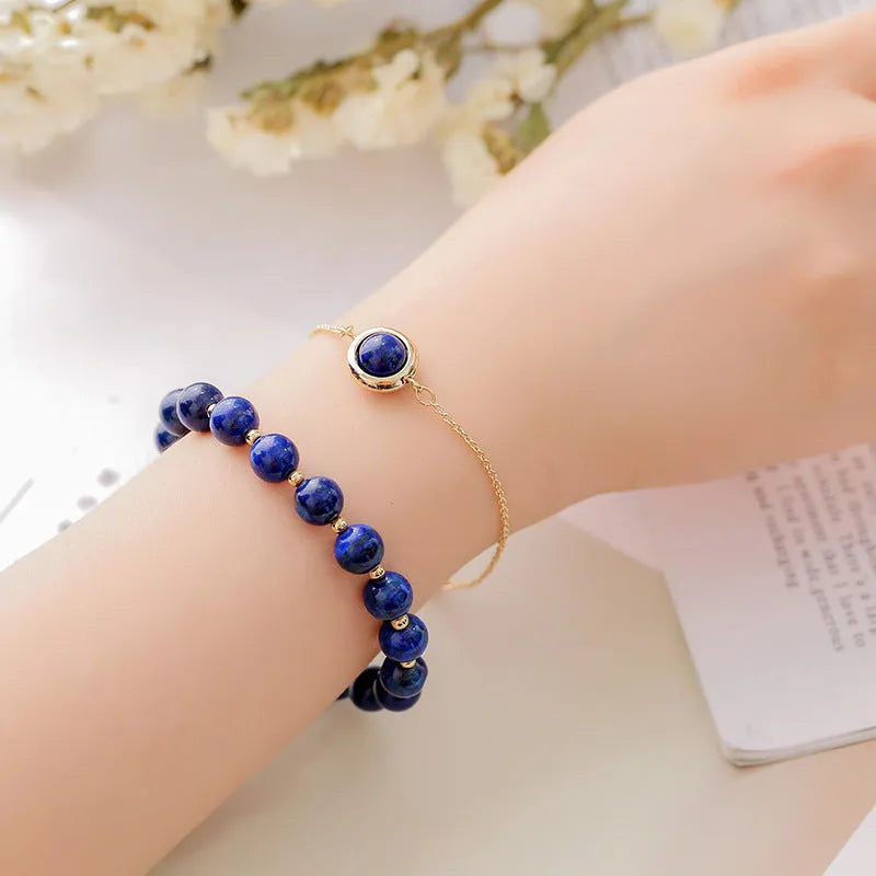 Double-layer women's bracelet with crystal beads and lucky charms in gold electroplated finish