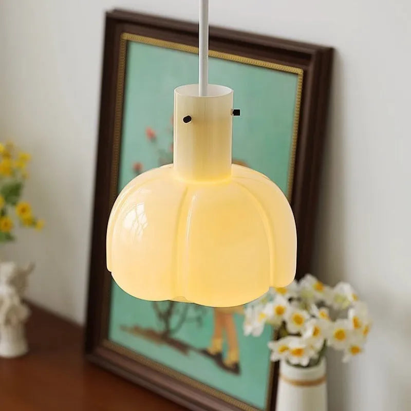 A medieval-style glass bud pendant chandelier light fixture with a retro design.