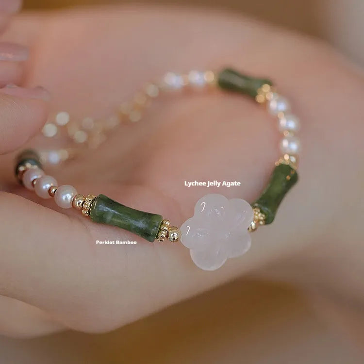 Chinese style olivine bamboo joint shell pearls bracelet with Hetian jade and copper detailing