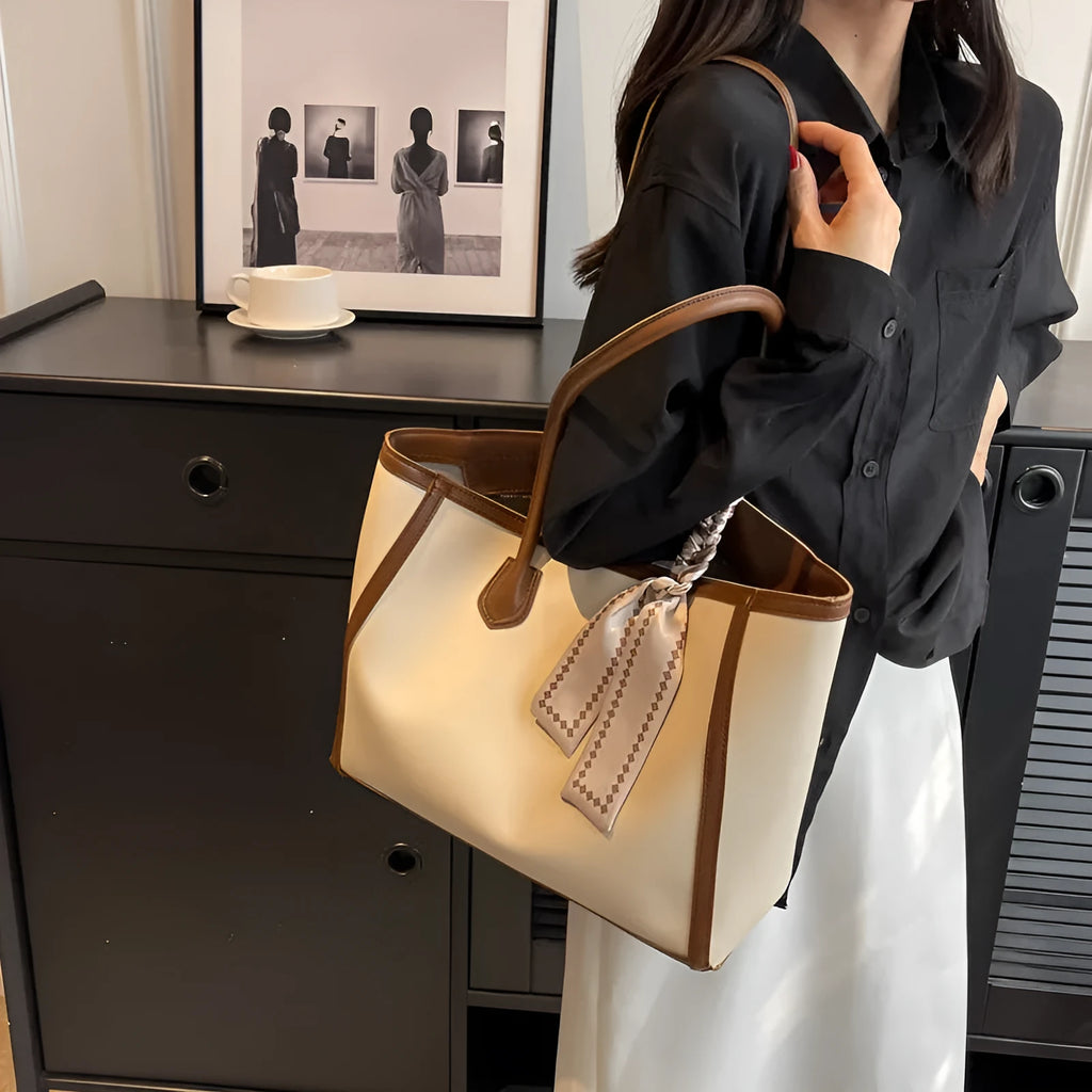 Soft PU leather commuter tote bag showing open outer pockets and horizontal square design