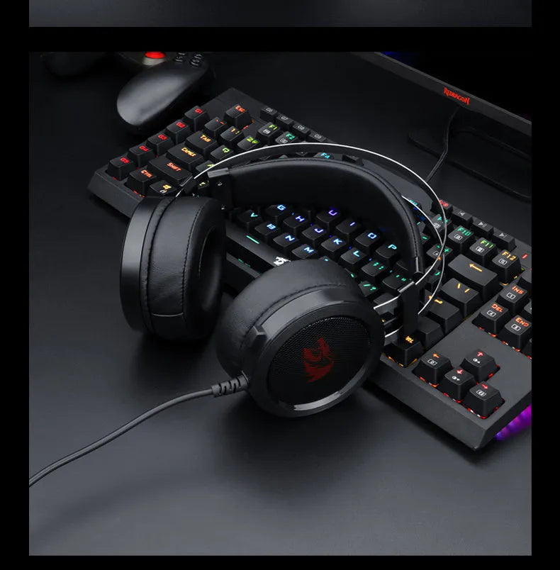 Black wired computer gaming headset with over-ear design and 3.5mm connector