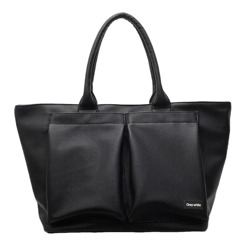 Sporty simplicity shoulder bag in solid colour with expandable 20-35L capacity