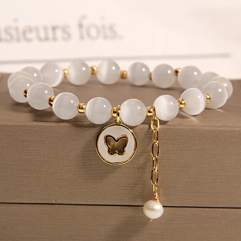 Korean-style white crystal cat's eye bracelet with geometric health care design