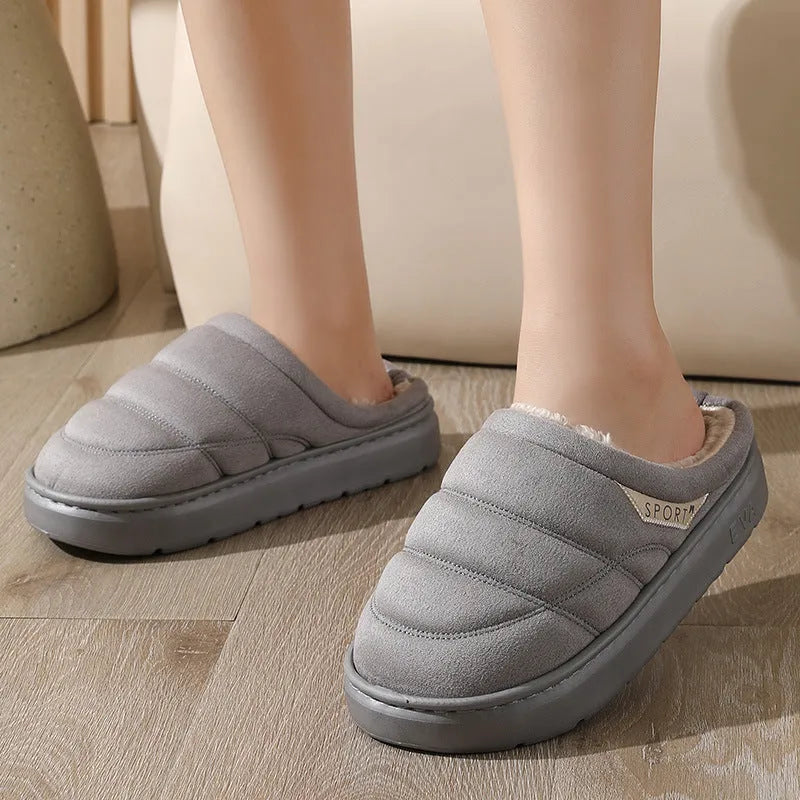 Plush indoor slippers with suede upper, EVA sole, and short plush lining in grey, khaki, coffee, or camel.
