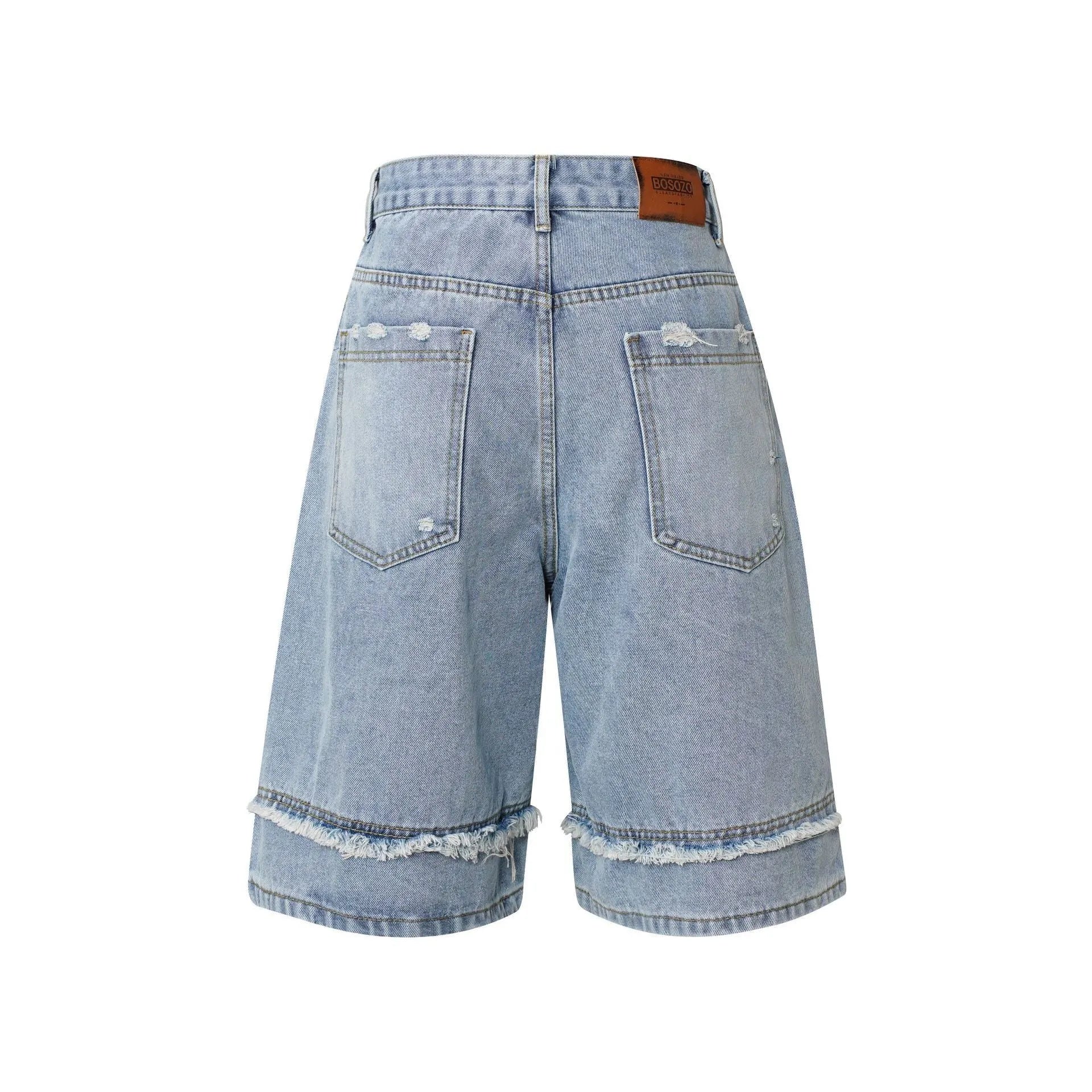 Distressed denim shorts with raw edge hem detail in straight leg cut