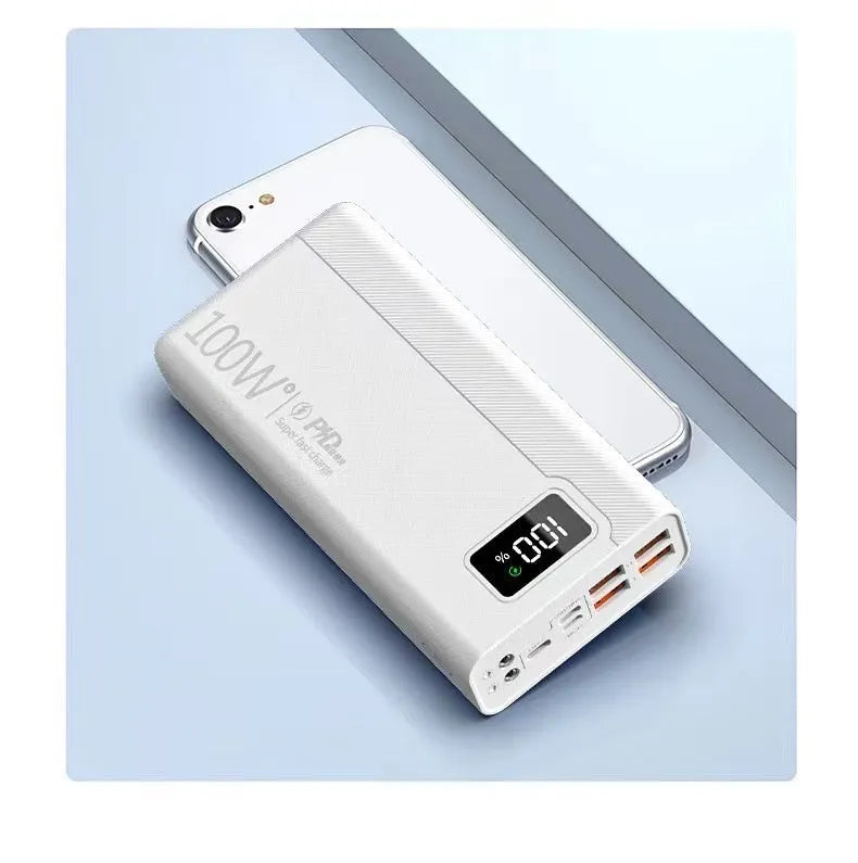 Large capacity power bank in black or white plastic casing showing front panel with charging ports