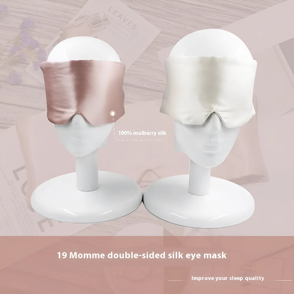 A mulberry silk sleep mask in Champagne Gold colour, shown folded and flat.