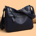Women's soft PU crossbody bag in urban minimalism style with diamond pattern stitching, 28x22x11cm