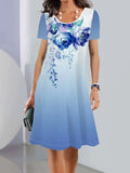 Women's floral print summer dress with short sleeves and an A-line midi skirt on a hanger.