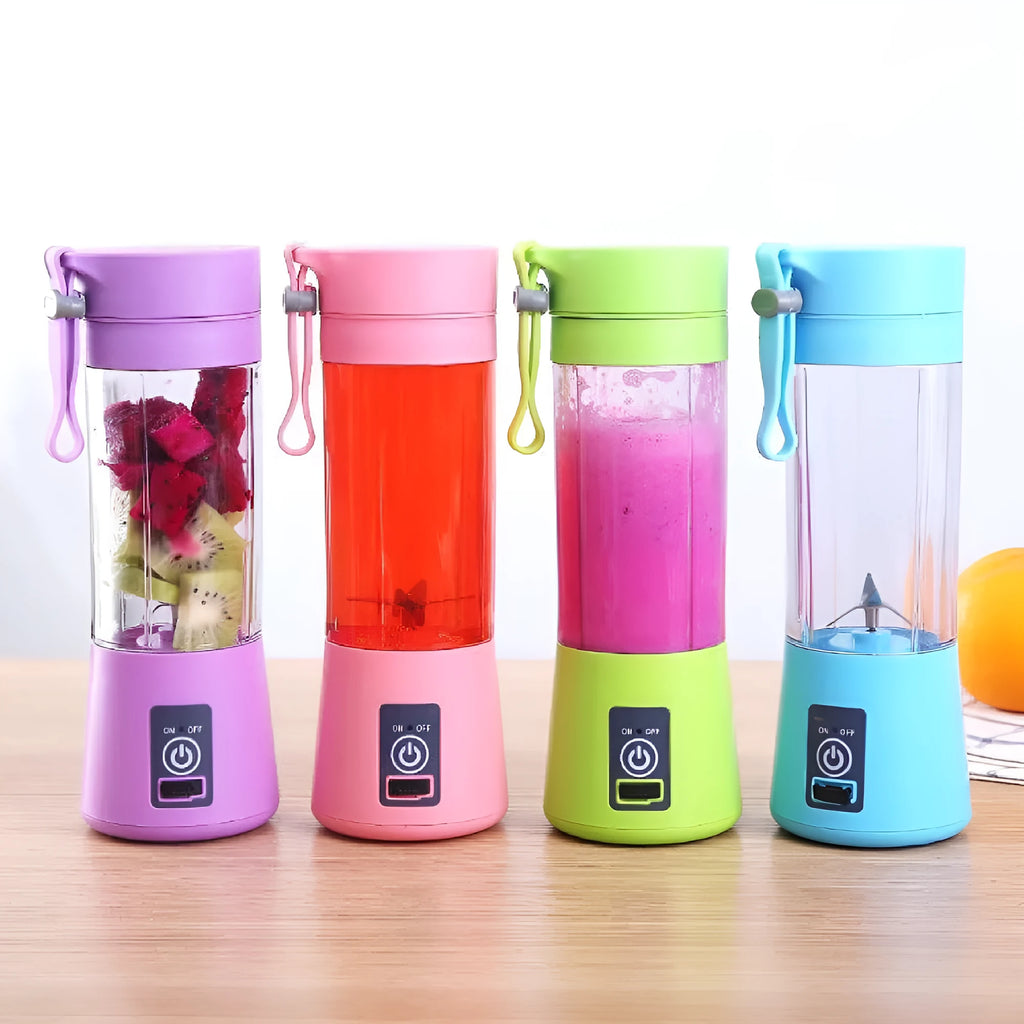 Pink portable USB rechargeable blender with six blades and a 380ml transparent cup on a table.