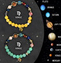 Set of twelve beaded bracelets, each with a different zodiac sign charm, made from natural stone on an elastic cord.