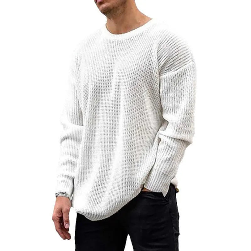 Men's solid colour round neck long sleeve acrylic sweater in black, folded flat on a white background