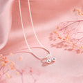 Silver cherry necklace for women with adjustable snake bones chain, showing detailed fruit pendant.
