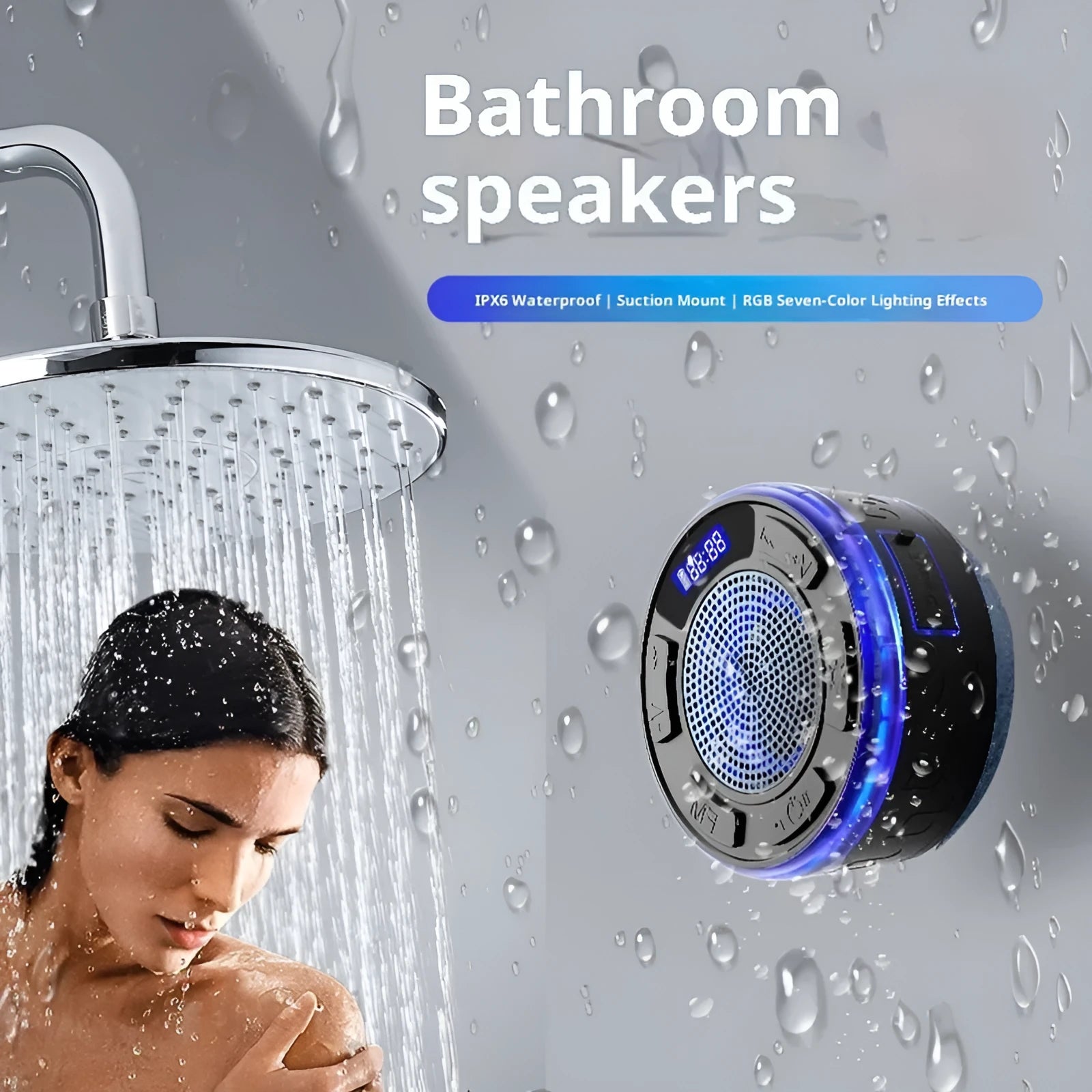 Waterproof Bluetooth speaker with large suction cup in black, mounted on bathroom tile