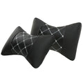Black artificial leather car headrest pillow with quilted diamond pattern and coloured stitching.