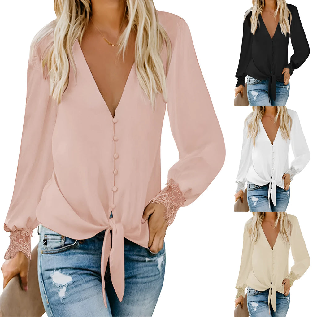 Women's loose V-neck long sleeve top with a lace-up tie detail at the hem in a solid colour.