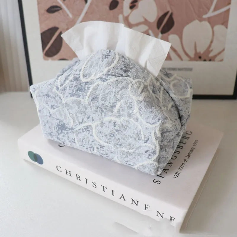 Chinese pastoral style cotton fabric tissue box cover in floral design on a table