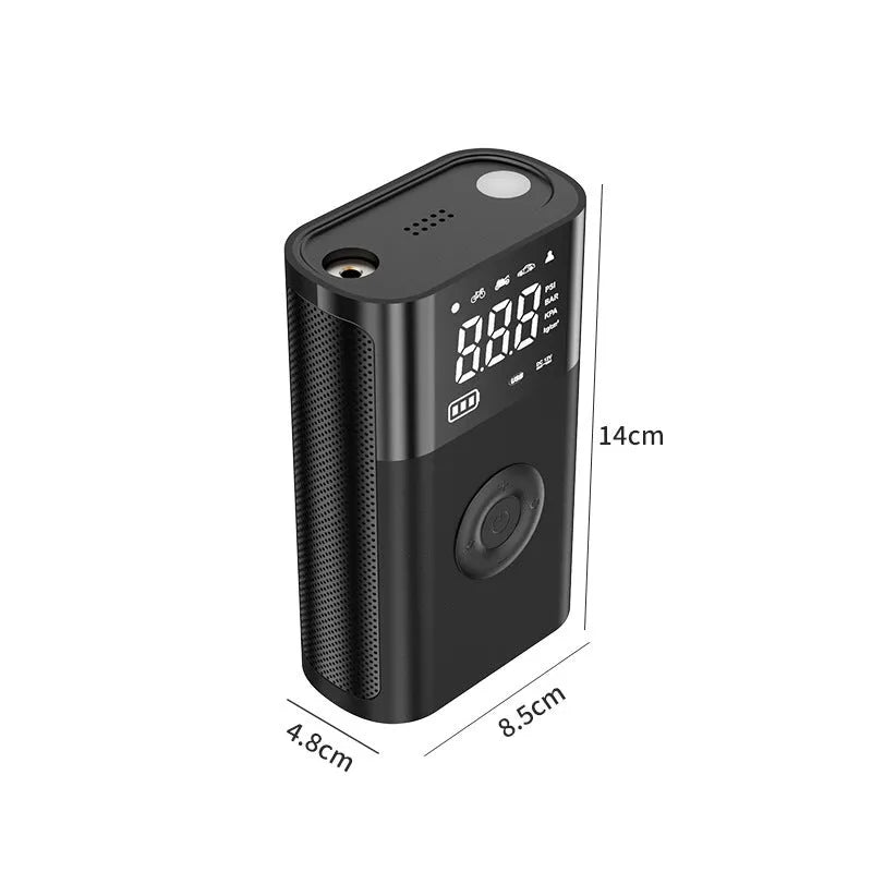 Black handheld wireless digital tyre inflator with LCD screen, showing pressure reading, with accessory nozzles