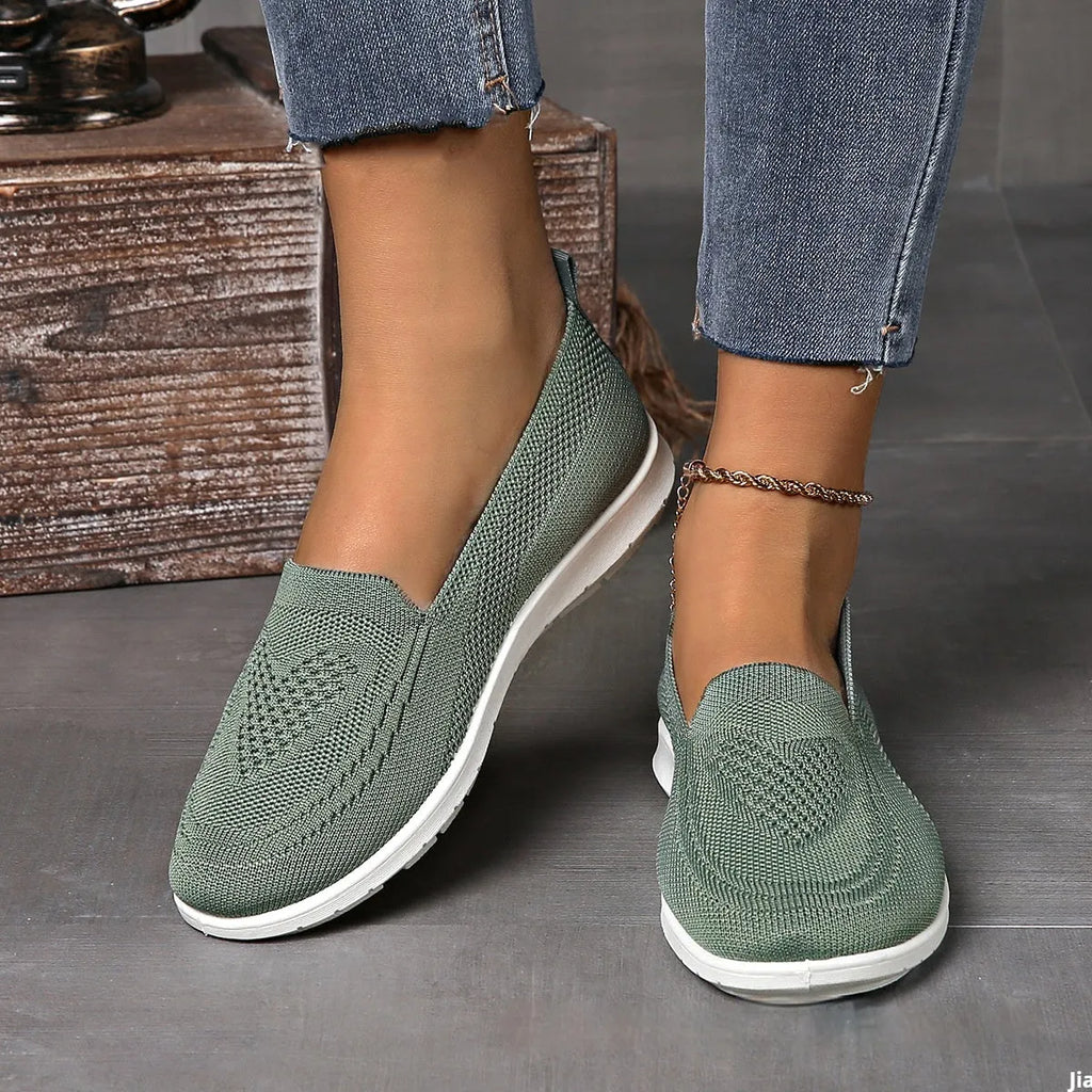 Women's plus size low-top casual cloth shoes with heart pattern and mesh lining in beige.