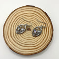 Silver alloy leaf earrings with embedded colourful moonstone, diamond cut treatment details