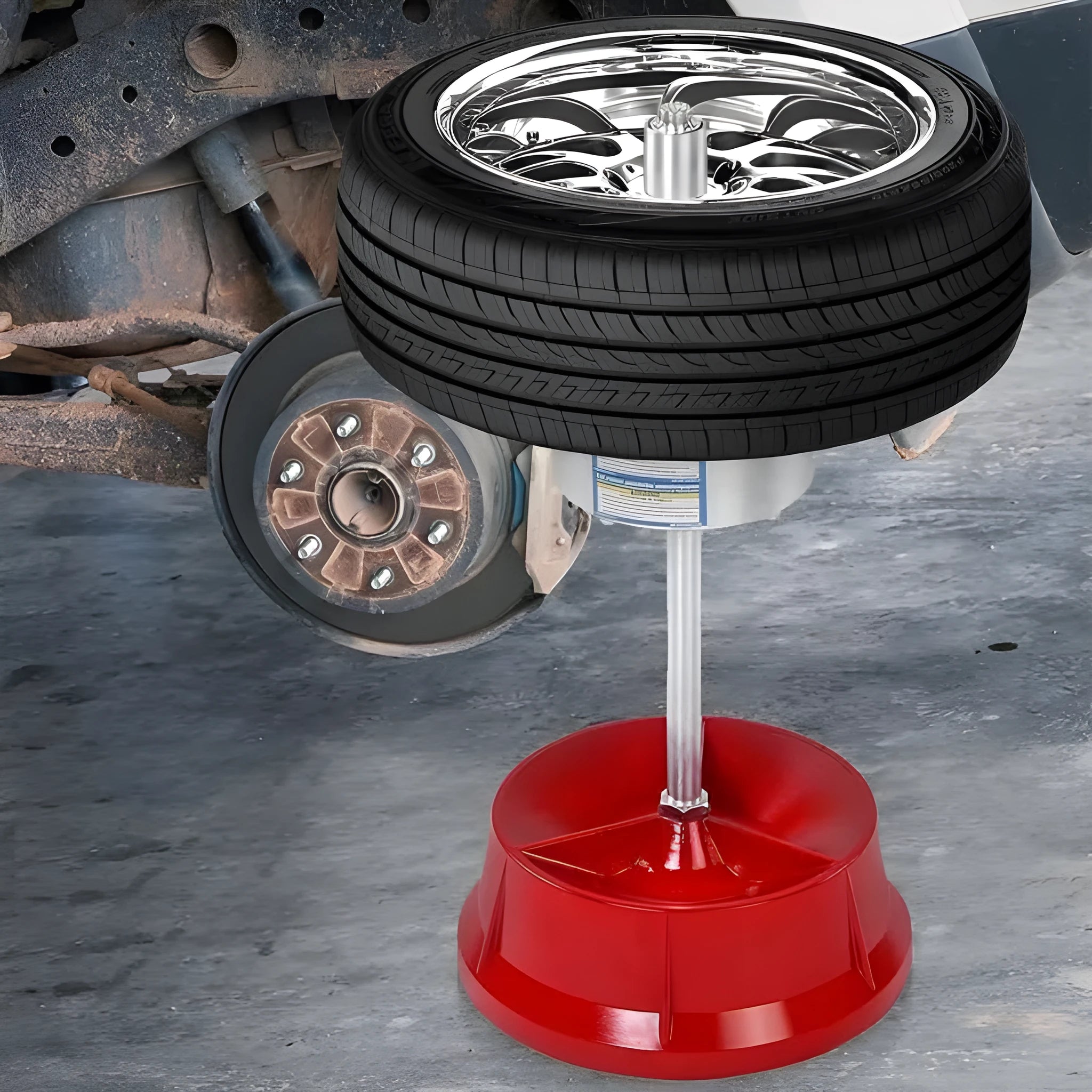 Portable wheel hub balancer with aluminium head and bull's eye level on an enamel base.