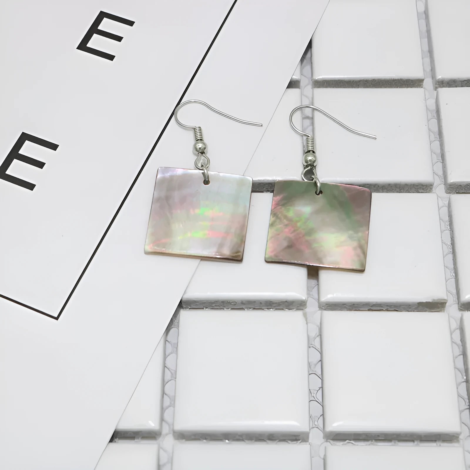 Geometric shell earrings for women in rectangular shell and square panther designs with retro natural styling