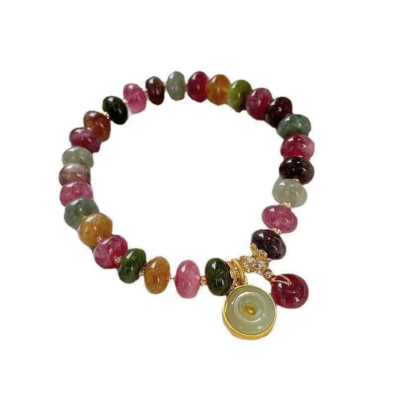 Natural stone abacus bead bracelet with a colourful tourmaline rabbit pendant.