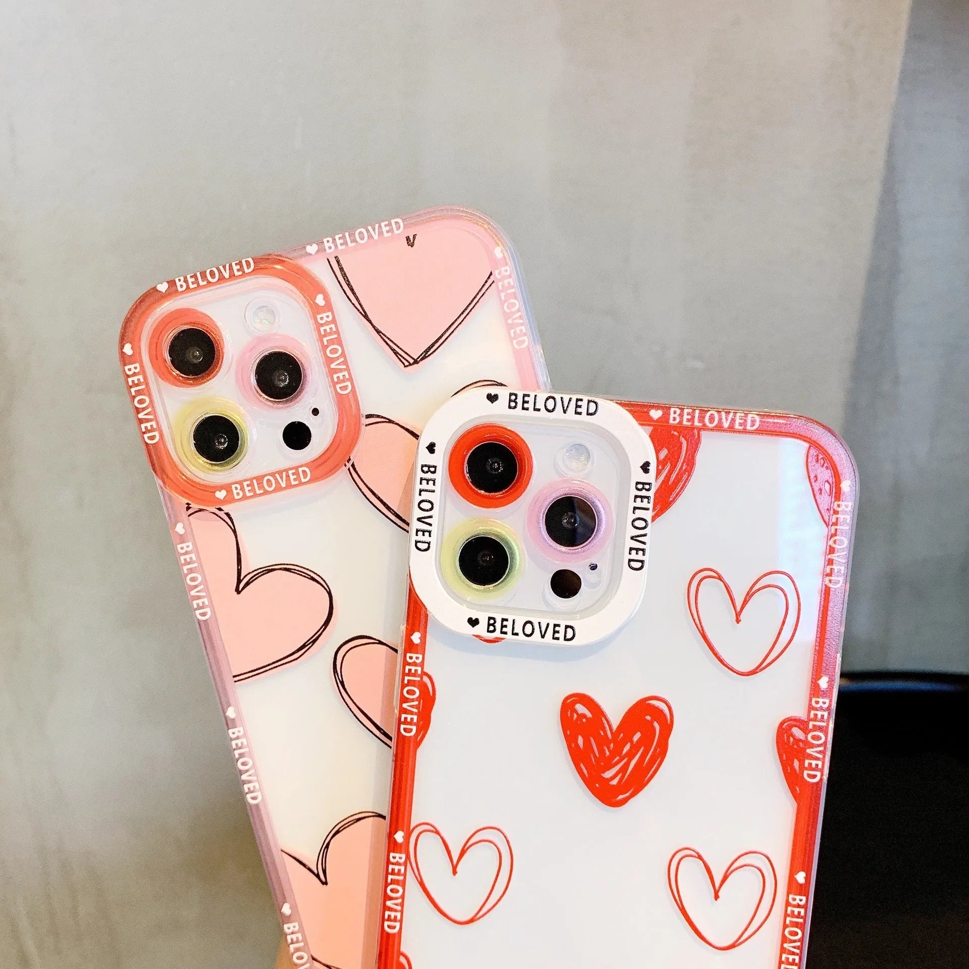 Pink mobile phone case with love heart and angel eyes design for iPhone.
