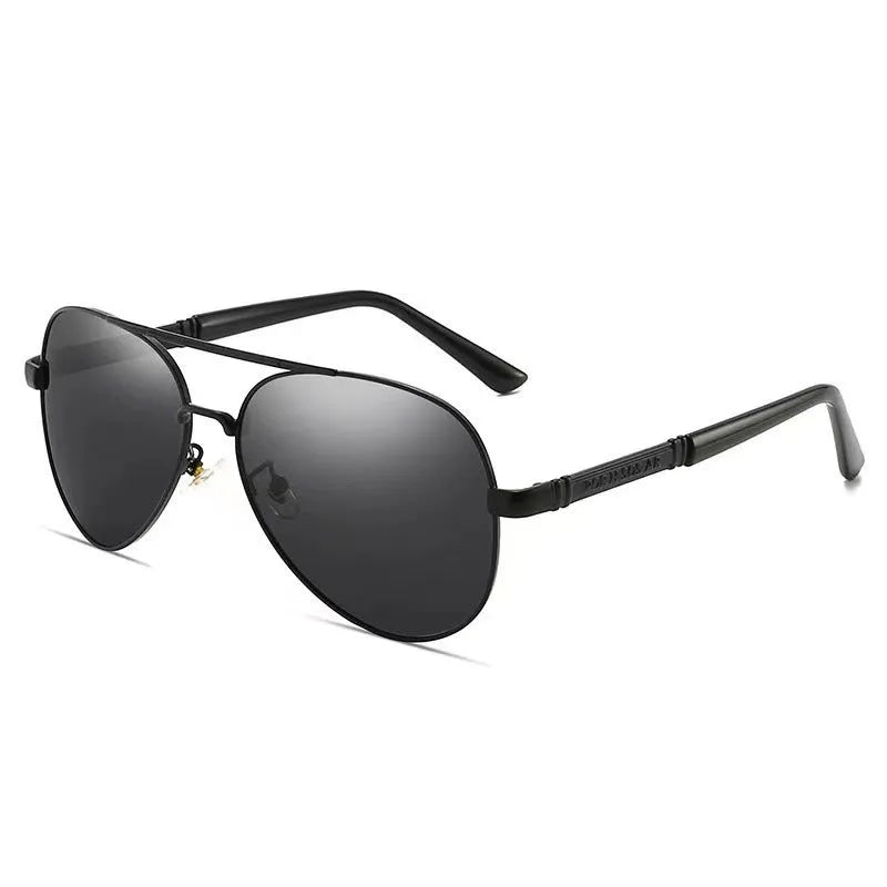 Man wearing gold metal frame polarised sunglasses with dragon decoration and grey lenses.