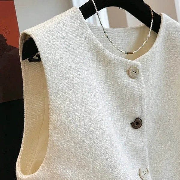 Women's sleeveless polyester bandage vest dress with round neck in milky white or black
