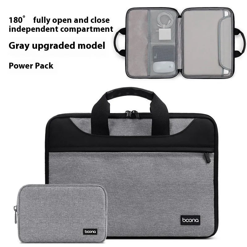 Black Oxford cloth laptop bag with soft carry handle, shown closed, for business travel.